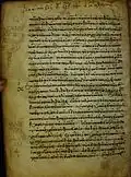 Folio 6 verso; some uncial notes at the left margin