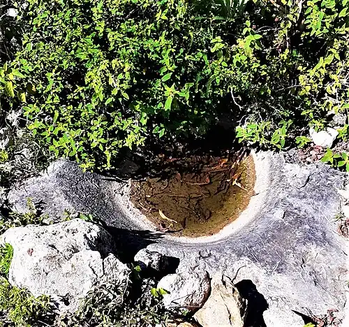 Stone in situ molcajete, probably pre-Hispanic, municipality of San Miguel Achiutla, Oaxaca, Mexico