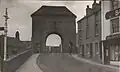 Monmouth Monnow Bridge 1930 from Town Side showing three cottages no longer there