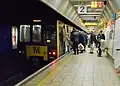 A Class 599 Metrocar bound for Newcastle Airport Metro station at platform 2.