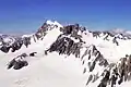 Aerial view from west with Mount Rudolf centred. De La Beche and The Minarets in back.