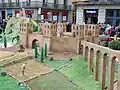 Representation of the walls of Barcino in a nativity scene located in the Plaça de Sant Jaume in 2014.