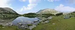 A glacial lake and a mountain summit