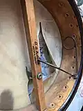 Mute mechanism of A. A. Farland banjo.