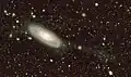 NGC 424 imaged by legacy surveys, showing that this galaxy has a tidal structure