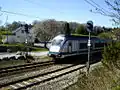 A local train arrives at the station