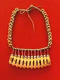 Necklace: sperm whale teeth, glass beads, spondylus disks, plant fiber, Marshall Islands, 1891 (Staatlichen Museums für Völkerkunde München)
