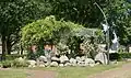 Statue of Meester Siebering in a pergola