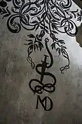 The NMD initials with Swiss degen, signature of his ornamental painting of ceiling of the choir in Bern Minster (1516/7)