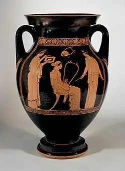 Woman with barbiton, from red-figure amphora, Greece, circa 460-450 B.C. The larger instrument would play deeper notes than a smaller lyre (seen hanging above the woman).