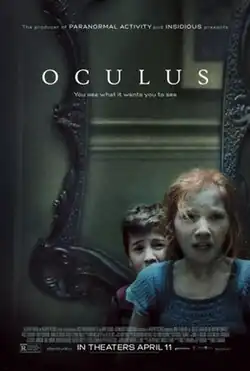 A girl and a boy stand scared in front of a mirror.