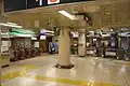 The west side ticket barriers next to the ticket barriers to Ogawamachi Station in May 2007