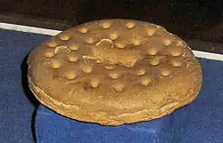 A ship's biscuit—purportedly the oldest (c. 1852) in the world—displayed at the maritime museum in Kronborg, Denmark