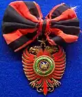 Commanders class of the order on a ladies bow.