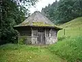 The octagonal structure beside the chapel