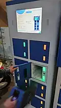 A user using Oyika Battery Swapping Cabinet in Tangerang, Indonesia.