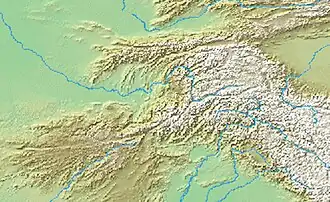 A mape of Tajikistan with a mark indicating the location of Karakul