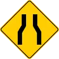 P-28 Roadway narrows on both sides