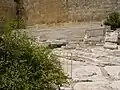 Pilgrim steps as they approach the Double Huldah Gate