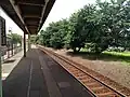 A view of the station platform and track.