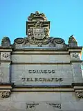 City coat of arms on top of both facades