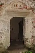 Remnants indicate formerly rich ornamentation.