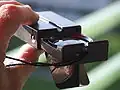 Swiss Army compass with 6400&nbsp;‰ ("artillery per milles")