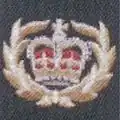 Crown flanked by wreaths