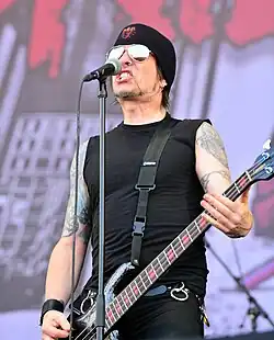 Bolan performing with Skid Row at Wacken Open Air in 2014