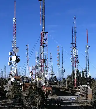 A mountaintop with many broadcast towers