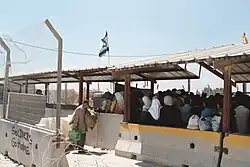 Israeli checkpoint outside the Palestinian city of Ramallah. August 2004