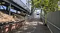 Station ramp and entrance leading up to Platform 1 from Johnston Street, November 2024
