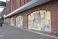Restored mural on wall of Sainsbury's super market Town Hall Square, Bexhill