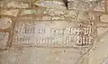 Datestone inside the south porch
