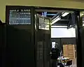Folding partition to bay off hall