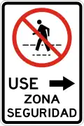 R-11-1a No pedestrian crossing, use safety zone to the right