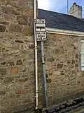 A pre-Worboys "SLOW MAJOR ROAD AHEAD" sign at Rozel bay