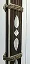 the inlays are usually mother-of-pearl, and the frets are generally made of string or gut.