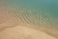 Sea at Pedn Vounder over sandbank