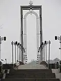 Simonas Daukantas Bridge in Kaunas with the Columns of the Gediminas on top.