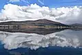 Slivnica and clouds reflected in the lake