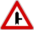 I-28.1 Crossing with minor road on the right.