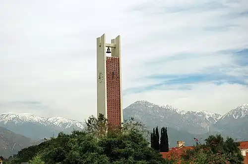 Smith Memorial Clock Tower, pictured against the San Gabriel Mountains