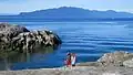 A couple on a rocky beach