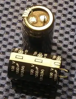Snap-in style of aluminum electrolytic capacitors for power applications