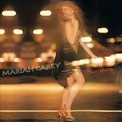 A full length image of Mariah looking over her shoulder