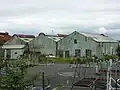 Derelict iron sheds, now demolished