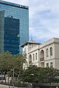 Levin House, 1924, on Rothschild Boulevard, flanked by modern glass tower