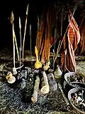Spears, calabashes, and bark cloth at Kiwumulo Cave