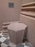 The top 18 feet (5.5&nbsp;m) of the steeple remain embedded in the ground next to the sanctuary.